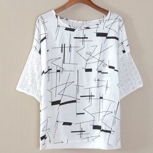 Women’s stylish top size medium NWT